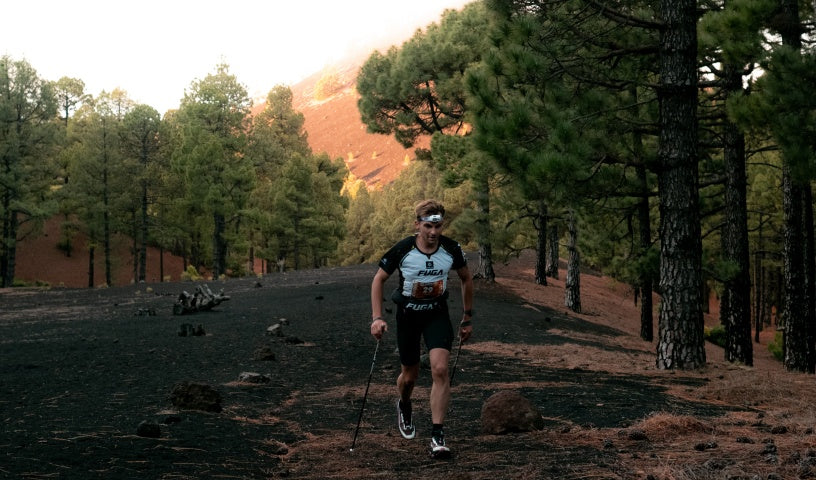 KAILAS FUGA runner climbing forest trail