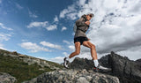 KAILAS FUGA trail runner on technical mountain terrain